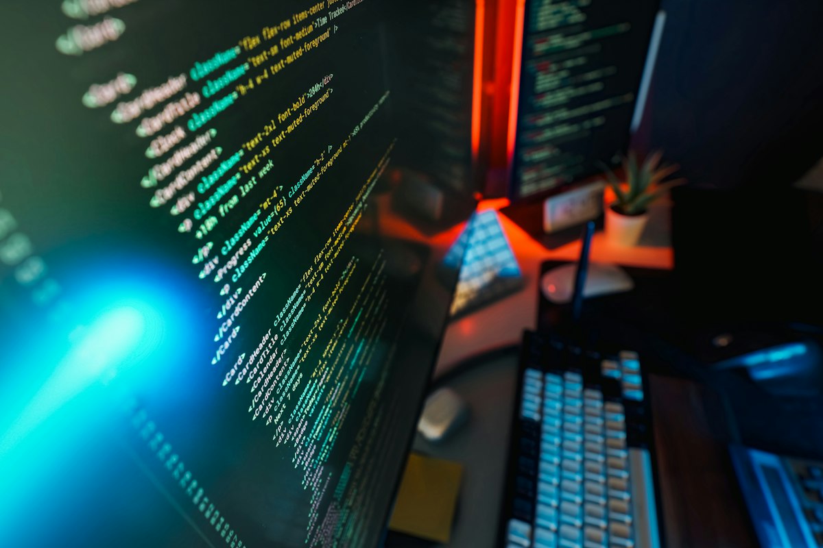 Colourful source code displayed across a dark editor window